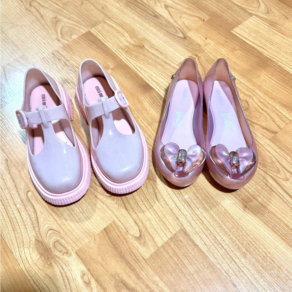 Two pairs of mini Melissa shoes